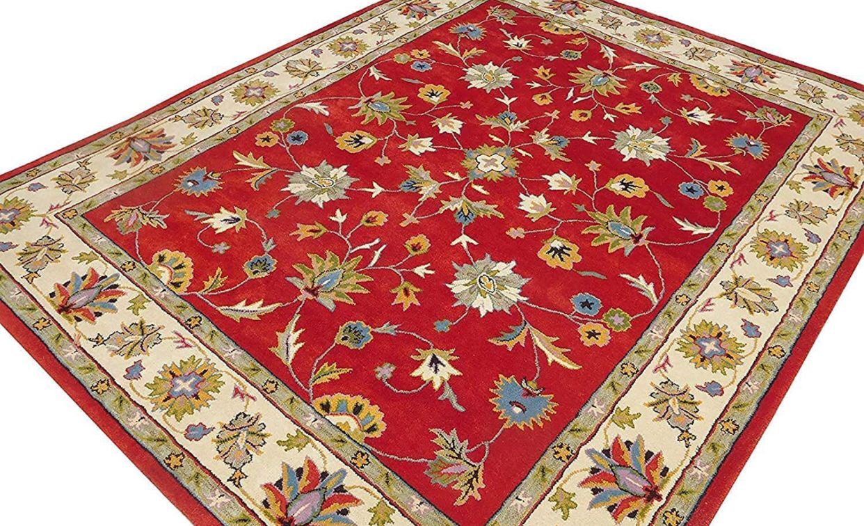 Red color designer persian carpet for your sweet home