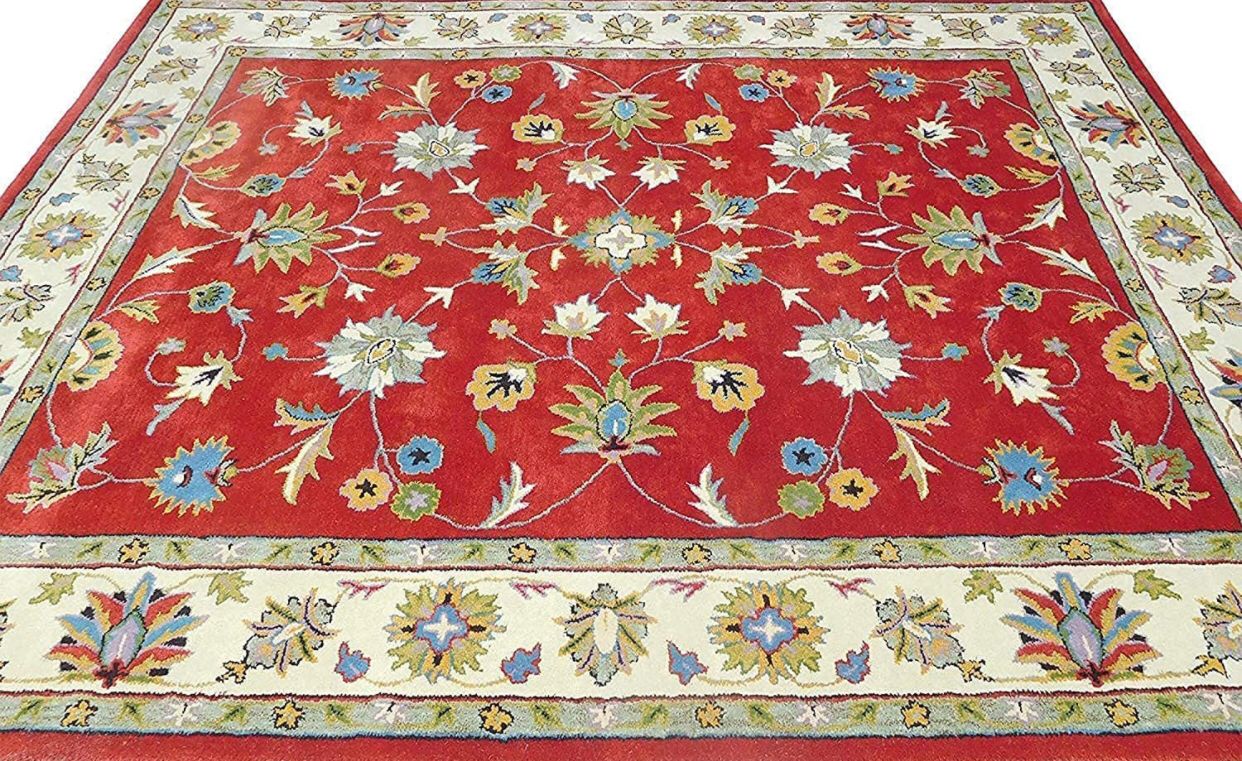 Red color designer persian carpet for your sweet home