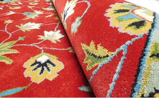 Red color designer persian carpet for your sweet home